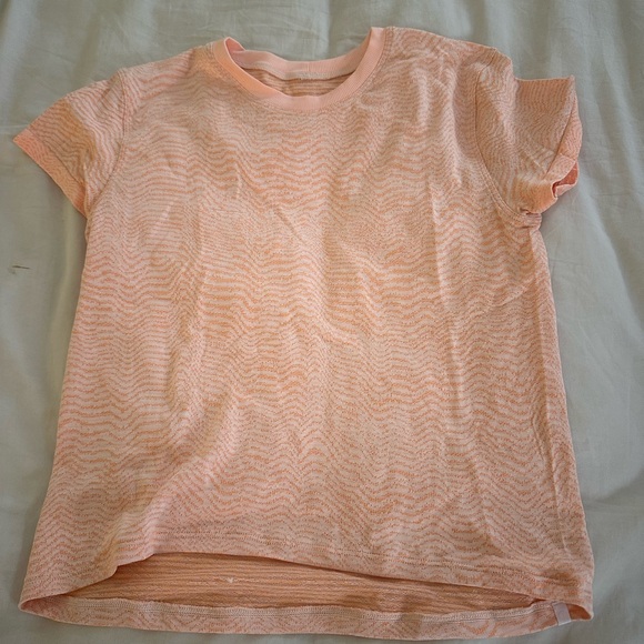lululemon athletica Tops - Lululemon athletic shirt. Super cute. Not sold anymore. Orange and white